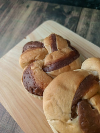 Bread on the wooden table. Selective focus and shallow depth of field.