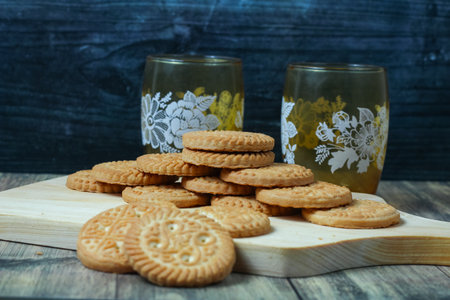 cookies with jam on a wooden background. tinting. selective focus