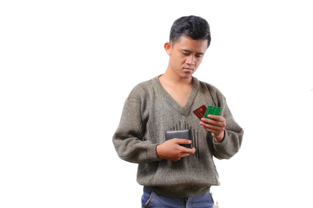 Young man holding and showing cards isolated on white background.