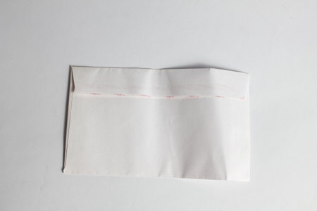 Black velvet bag isolated on white background.の写真素材