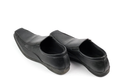 Black shoes isolated on a white background. Shallow depth of field.の写真素材