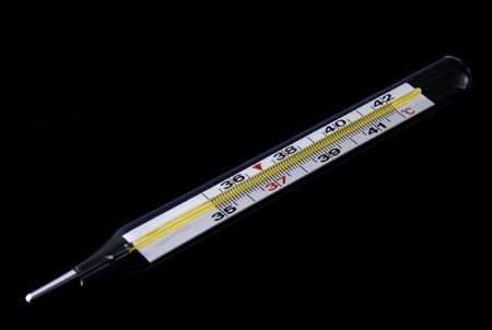 Thermometer on a black background mercury medical