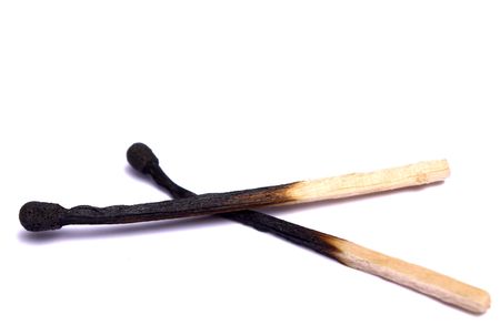burned down matches on a white background it is isolatedの写真素材