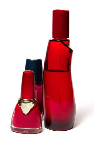 bottles with nail polish and fragrance isolated on whiteの写真素材