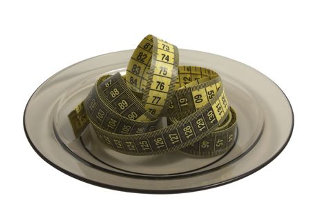 Plate with measuring tape isolated on white