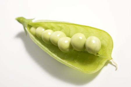 Pods of green peas on white backgroundの写真素材