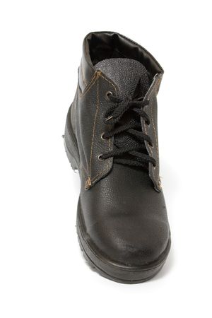 black work boot isolated on white backgroundの写真素材