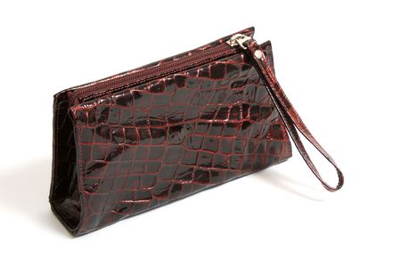 closed female bag for cosmetics on whiteの写真素材