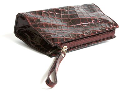 closed female bag for cosmetics on whiteの写真素材