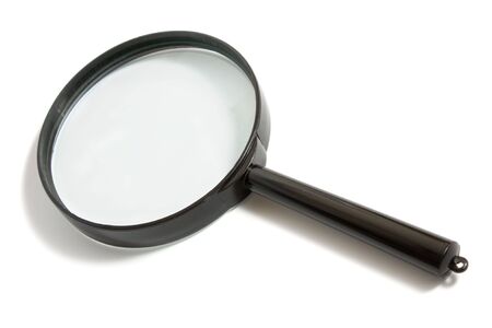Magnifying glass with the black plastic handle on a white background it is isolatedの写真素材