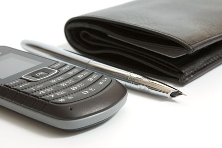 mobile phone, fountain pen, wallet on white backgroundの写真素材