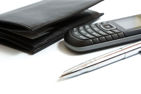 mobile phone, fountain pen, wallet on white backgroundの写真素材