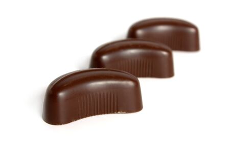 Chocolate sweets on a white background isolatedの写真素材