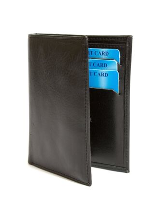 opened black leather wallet with credit cards isolated on whiteの写真素材