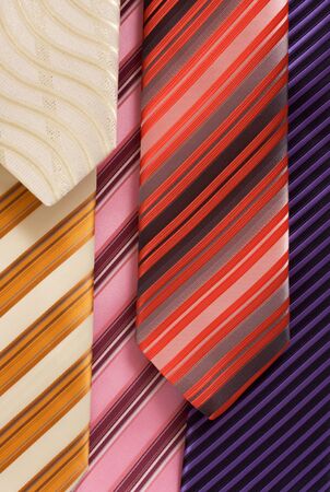 Fabric background from multi coloured striped tiesの写真素材