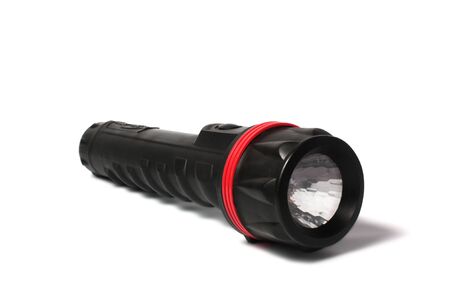 black flashlight with red stripe isolated on white background