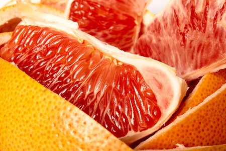 the food background from fresh red grapefruitの写真素材