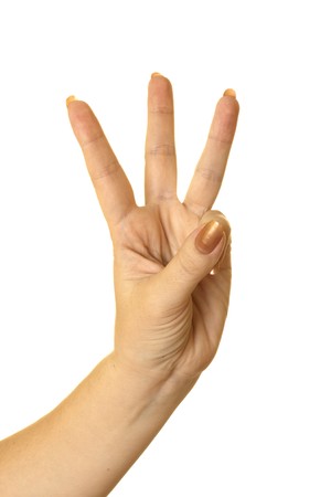 Three fingers being held in the air by a females hand. Isolated on white.の写真素材