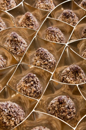 Chocolate sweets in packing from a golden foil