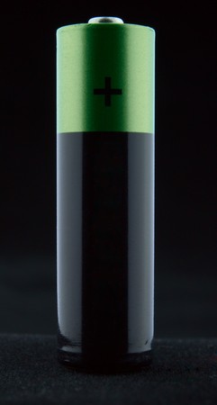 The AA battery on a black backgroundの写真素材