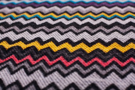 knitted woolen yarn ornament in the form of colorful waves