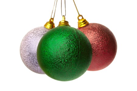 Three colored Christmas balls hanging on white background it's isolatedの写真素材