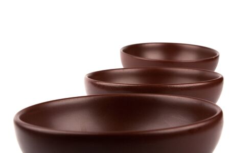 ceramic brown dishware isolated on white backgroundの写真素材