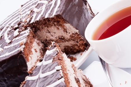 the chocolate cake and cup of teaの写真素材