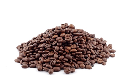 heap of coffee beans isolated on white backgroundの写真素材
