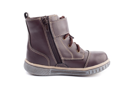 Children's boot brown, leather, autumn on a white backgroundの写真素材