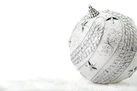 Silver Christmas bauble on the white backgroundの写真素材