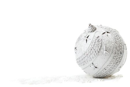 Silver Christmas bauble on the white backgroundの写真素材