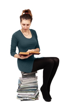 A woman reading book isolated on white background  Concept of education の写真素材
