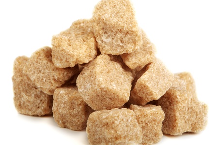 pieces of cane brown sugar on a white background isolatedの写真素材