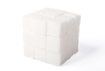 cube shape from pieces of white sugarの写真素材