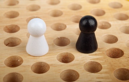 A pair of figures on the board  The concept of cooperation or competition の写真素材