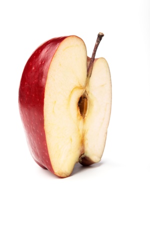 A Half of red apple on white background with shadowsの写真素材