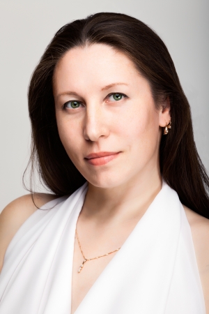 portrait of a beautiful brunette in  white dressの写真素材