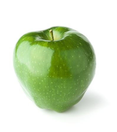 A green Delicious Apple on white background with shadowsの写真素材