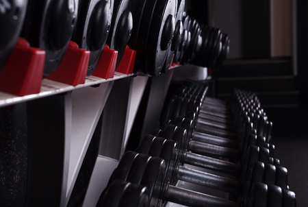 Close-up shot of a set of dumbbells with selective focus.の写真素材