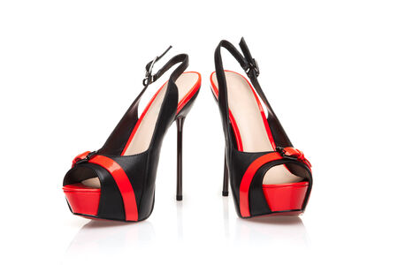 women's high-heeled shoes on a white backgroundの写真素材