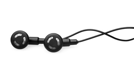 black earbuds on white background with shadowの写真素材