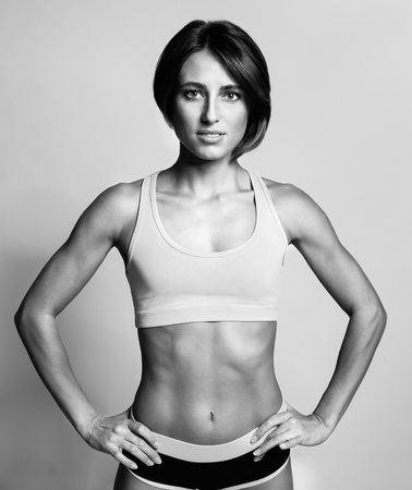 portrait of a beautiful sporty woman with small breastsの写真素材