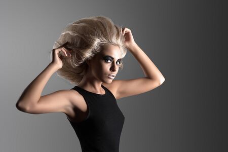 Updo Vogue Style. Woman with Futuristic Hairdo. Fashion. Hairstyleの写真素材