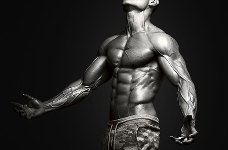 Strong Athletic Man Fitness Model Torso showing six pack abs. isolated on black background with clipping pathの写真素材