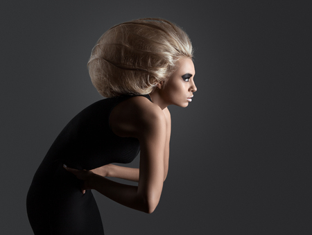 Updo Vogue Style. Woman with Futuristic Hairdo. Fashion. Hairstyleの写真素材