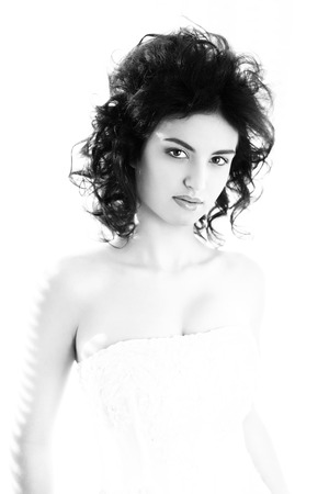 Pretty brunette woman. Black and white female portrait.の写真素材