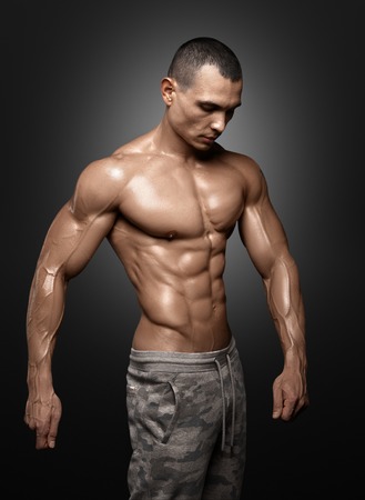 Strong Athletic Man Fitness Model Torso showing big musclesの写真素材