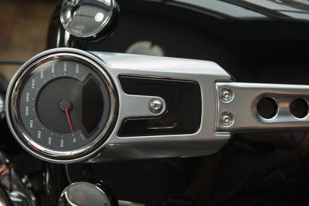 motorcycle speedometer and part of the gas tank