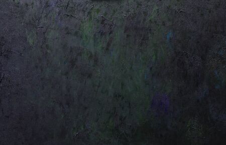 Abstract dark artistic background of a canvas covered with strokes of oil paint.の写真素材